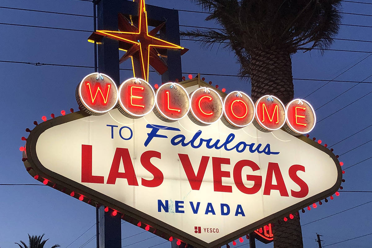 The "Welcome to Fabulous Las Vegas" sign is lighted up in red on Tuesday, May 5, 2020, in honor ...