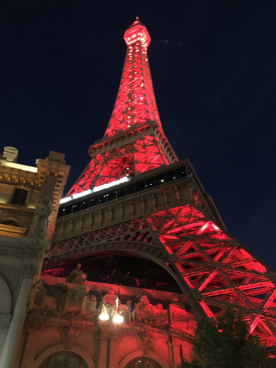 Paris Las Vegas is lighted up in red on Tuesday, May 5, 2020, in honor of National Travel and T ...