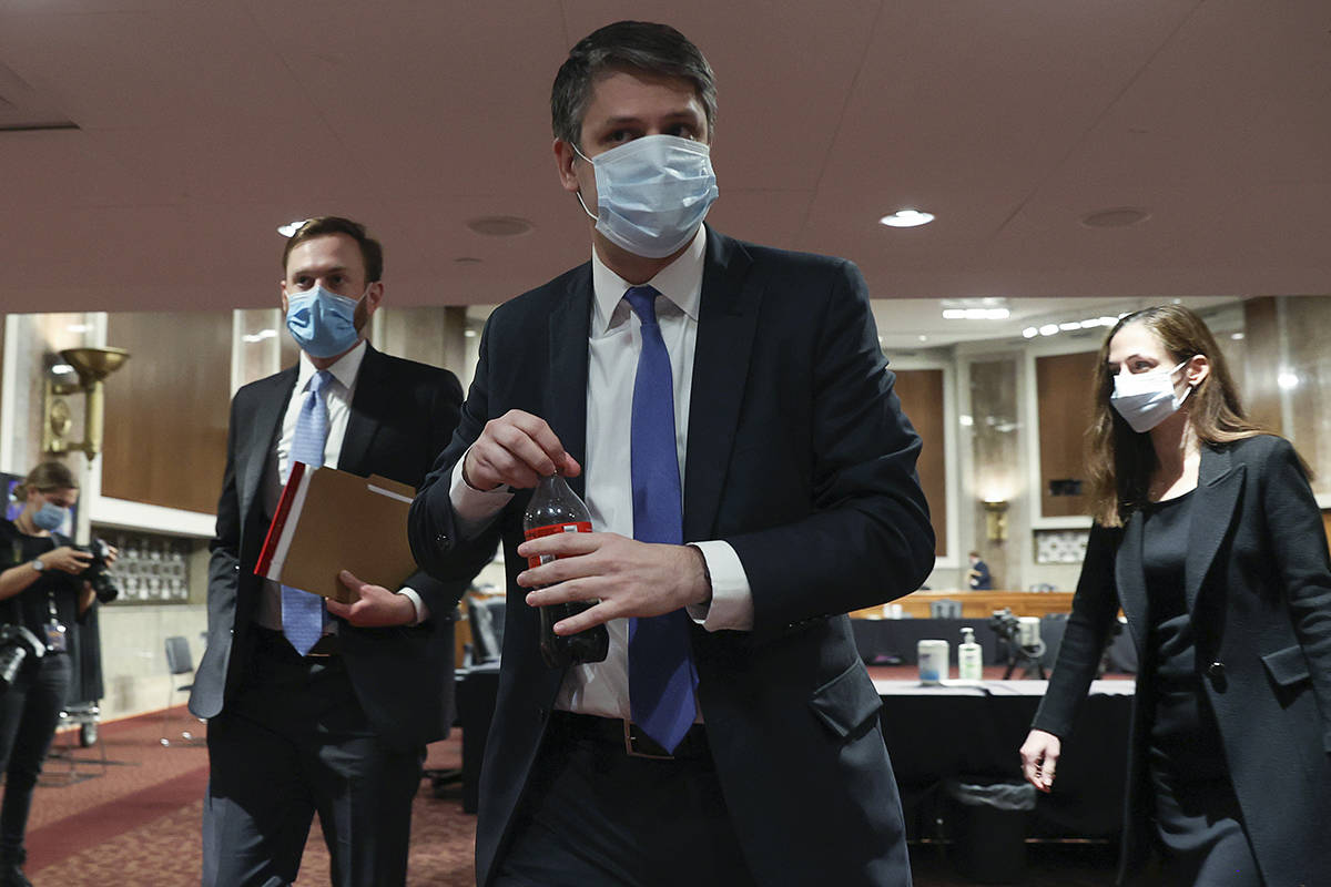 Judge Justin Walker leaves after testifying in a Senate Judiciary Committee hearing on Walker's ...