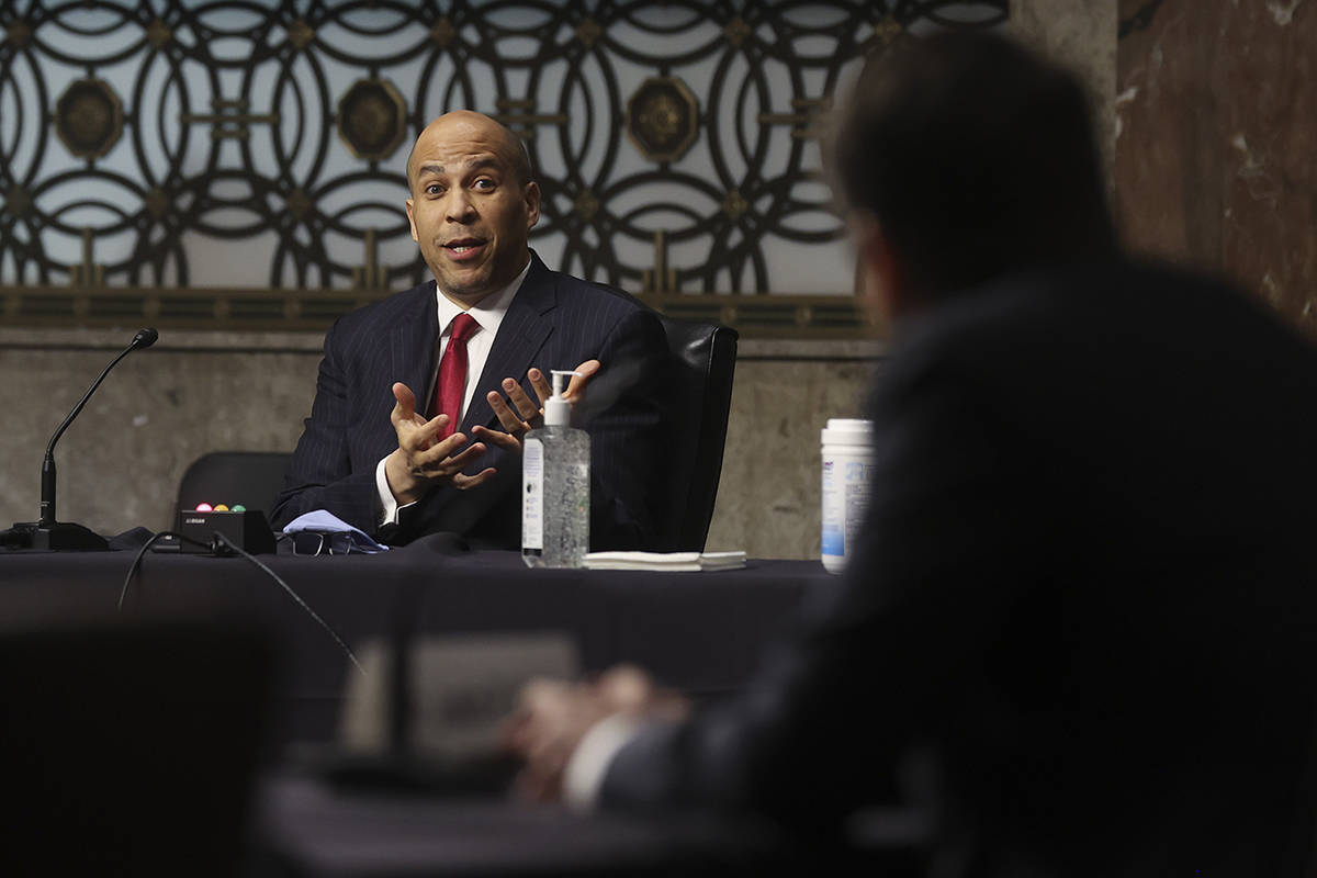 Sen. Cory Booker, D-N.J., questions Justin Walker during a Senate Judiciary Committee hearing o ...