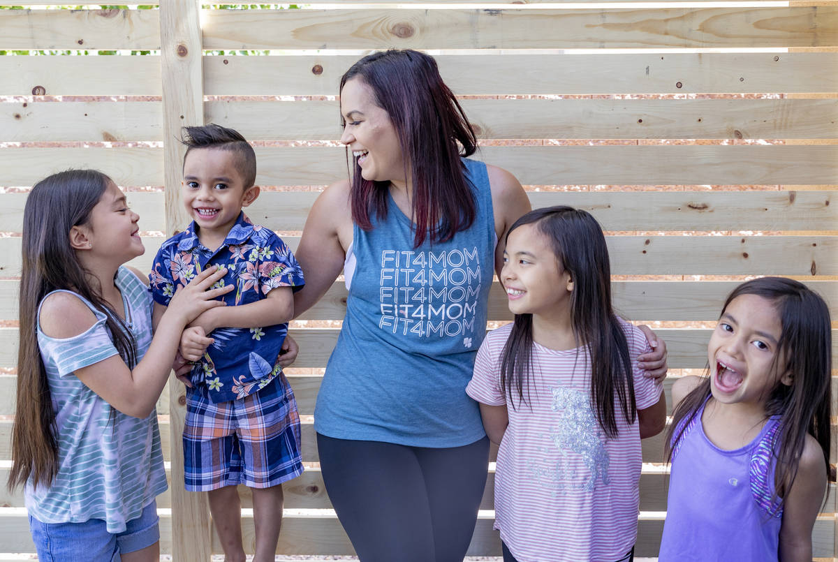 Owner of FIT4MOM Las Vegas Jessica Peralta is photographed with her four children, Grace, 9, fr ...