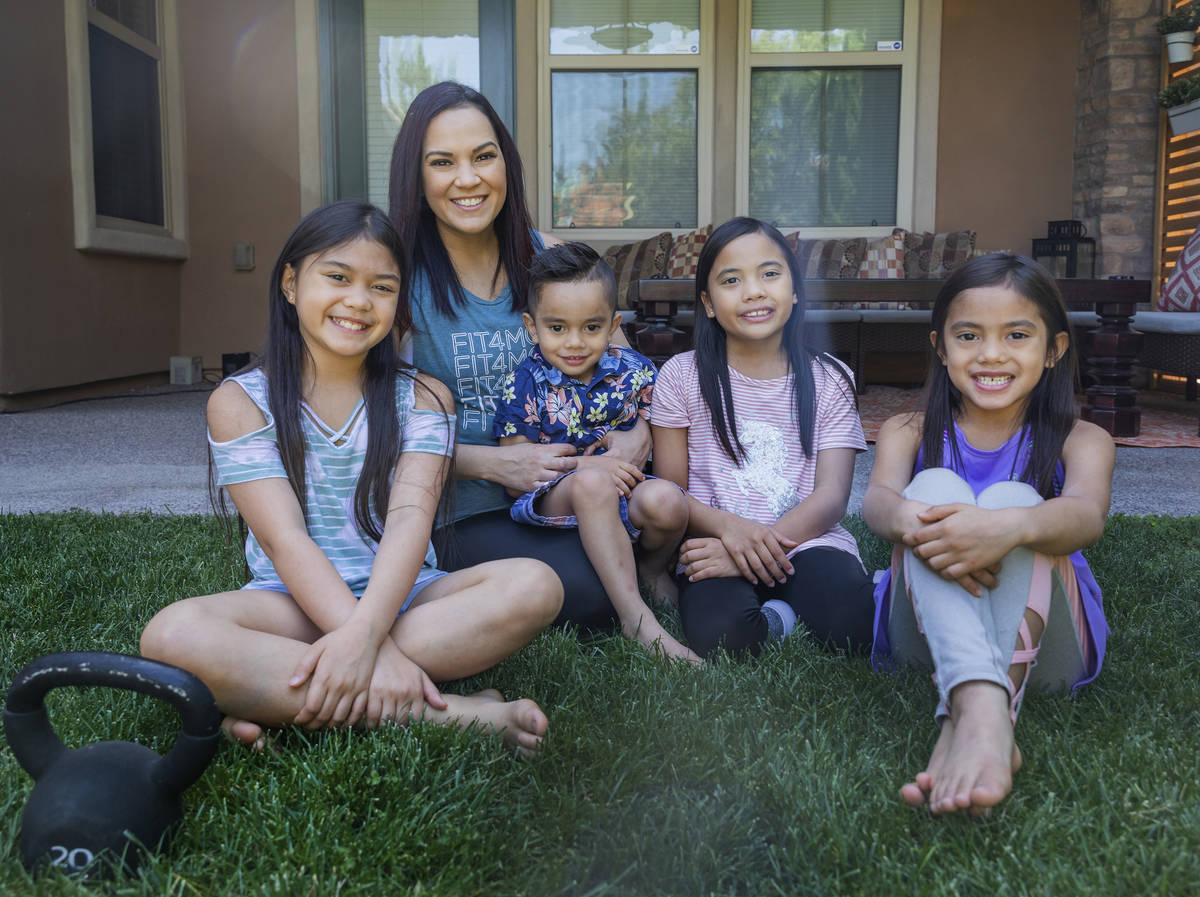Owner of FIT4MOM Las Vegas Jessica Peralta is photographed with her four children Grace, 9, fro ...