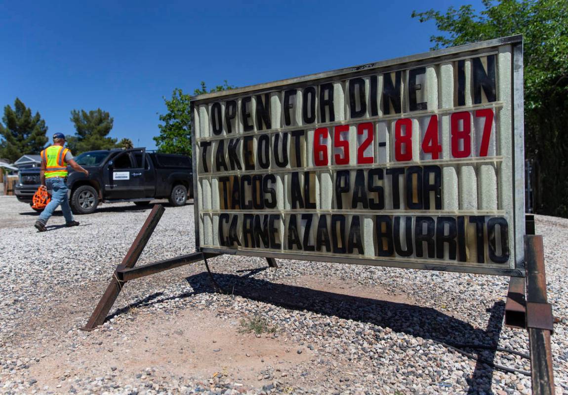 Signage announcing diners are welcome to eat inside at St. Helen's Restaurant on Tuesday, May 5 ...
