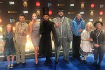 Cirque artists are shown on the Blue Carpet prior to "One Night For One Drop," held at O Theate ...