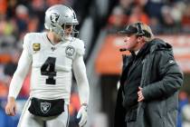 Oakland Raiders quarterback Derek Carr (4) and head coach Jon Gruden discuss a play call during ...