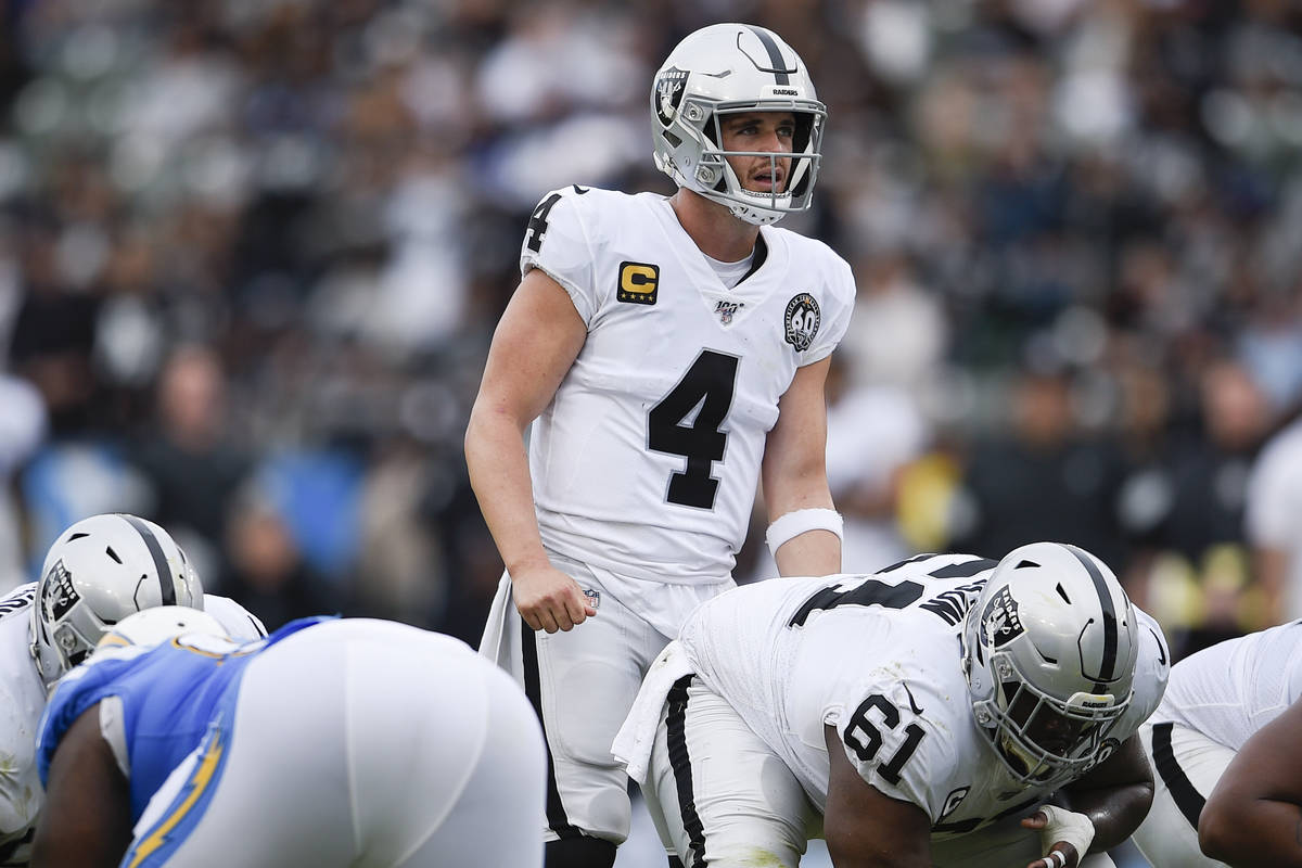 Oakland Raiders quarterback Derek Carr in action during the second half of an NFL football game ...