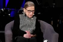 FILE - In this Dec. 17, 2019, file photo Supreme Court Justice Ruth Bader Ginsburg speaks with ...