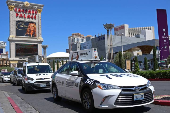 Cab drivers pull into the taxi pick up lane at Caesars Palace in Las Vegas in 2017. (Las Vegas ...
