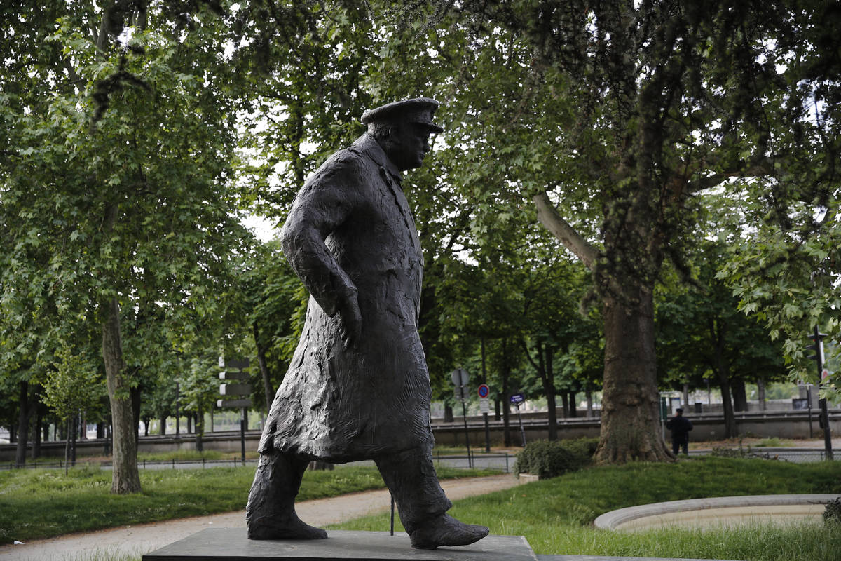 The statue of Britain's wartime Prime Minister Winston Churchill stands in the garden surroundi ...
