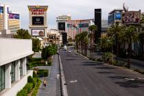 A man walks along the Las Vegas Strip on Thursday, April 16, 2020. (Chase Stevens/Las Vegas Rev ...