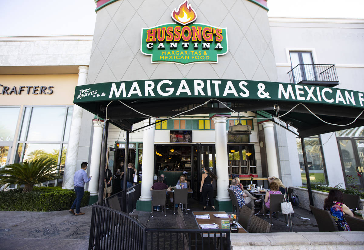 People dine at Hussong’s Cantina in Boca Park as some restaurants open