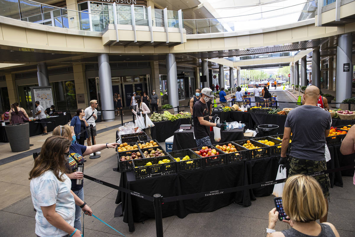 people-stop-by-the-las-vegas-farmers-market-at-downtown-summerlin-in