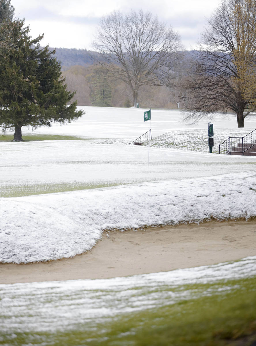 The greens and fairways are covered in snow, just as golf courses were starting to open for the ...