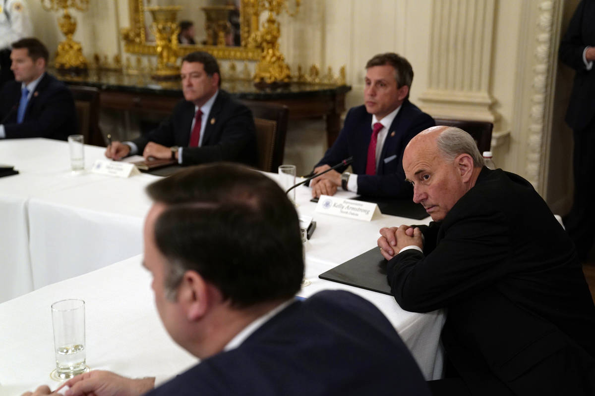 FILE - In this May 8, 2020, file photo Rep. Louie Gohmert, R-Texas, right, listens during a mee ...
