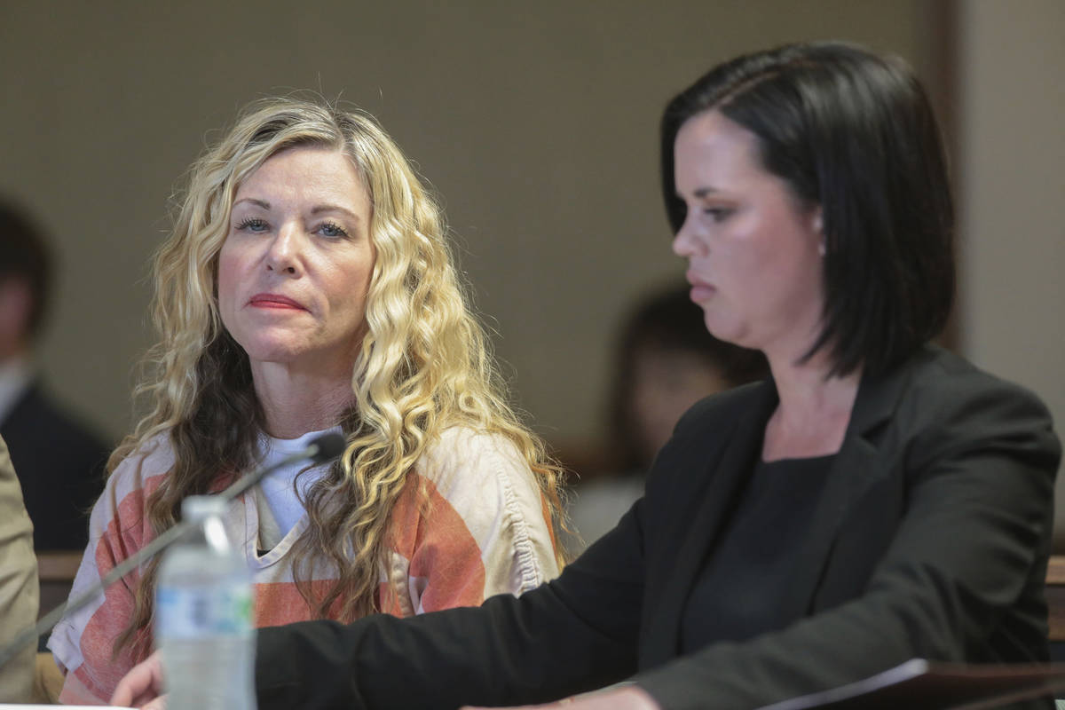 FILE - This March 6, 2020, file photo shows Lori Vallow, left, glancing at the camera next to h ...