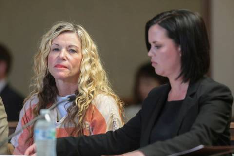 FILE - This March 6, 2020, file photo shows Lori Vallow, left, glancing at the camera next to h ...