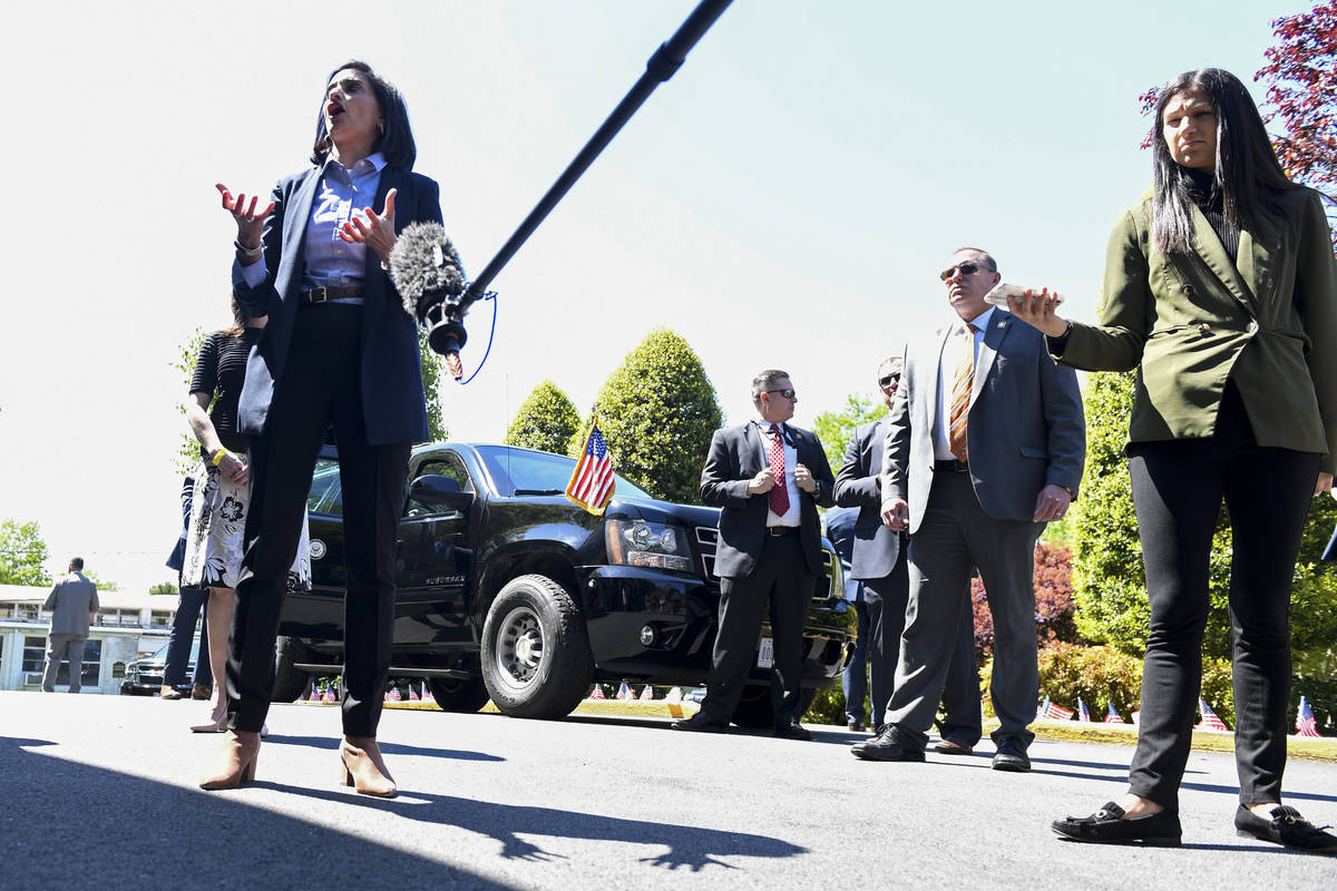 In this May 7, 2020, photo, Katie Miller, press secretary for Vice President Mike Pence, right, ...