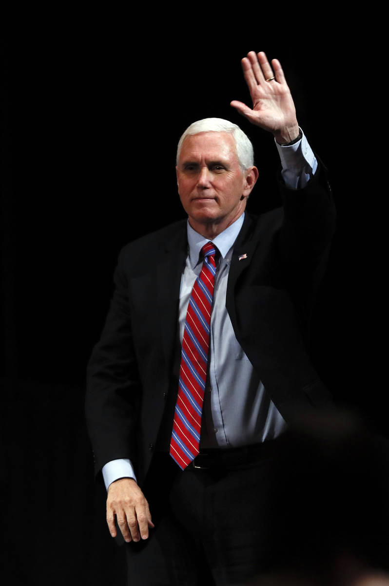 Vice President Mike Pence reacts to audience members after a roundtable with agriculture and fo ...