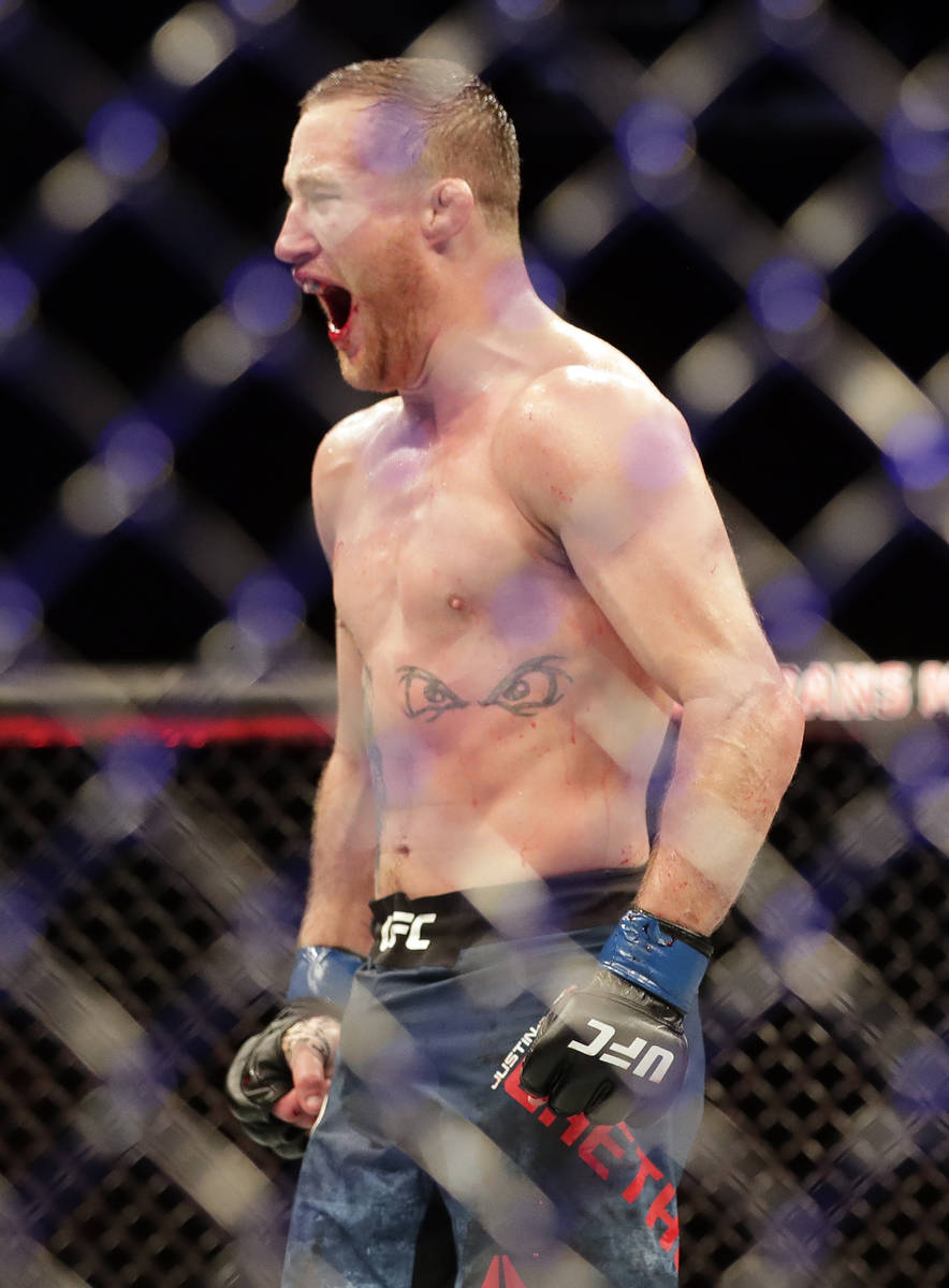 Justin Gaethje celebrates after winning his match against Tony Ferguson in a UFC 249 mixed mart ...