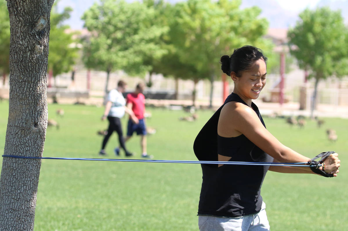 Liberty High School basketball player Raina Bitanga works out at Cornerstone Park on Monday, Ma ...