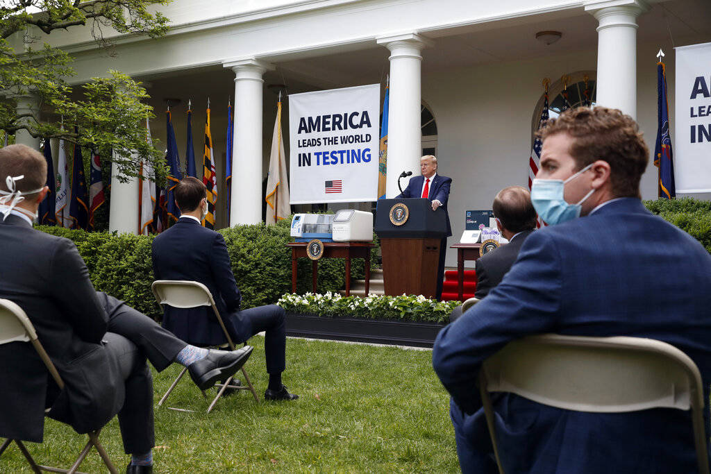 President Donald Trump speaks about the coronavirus during a press briefing in the Rose Garden ...