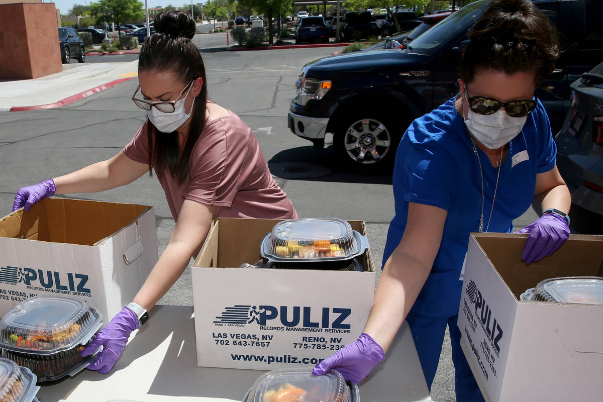 Comprehensive Cancer Centers of Nevada staff members, including from left, Amy Lowe, office man ...