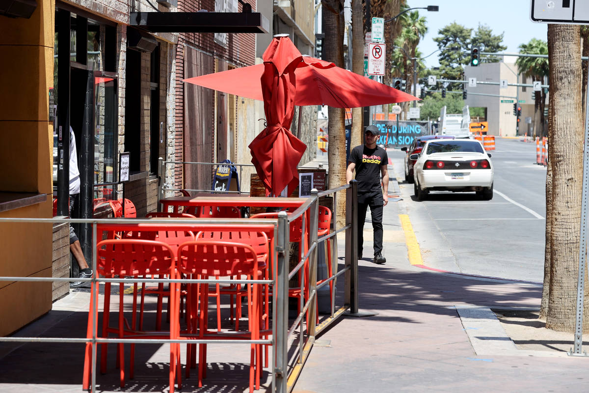 A Nacho Daddy worker arrives at the restaurant on 4th Street in downtown Las Vegas Tuesday, May ...