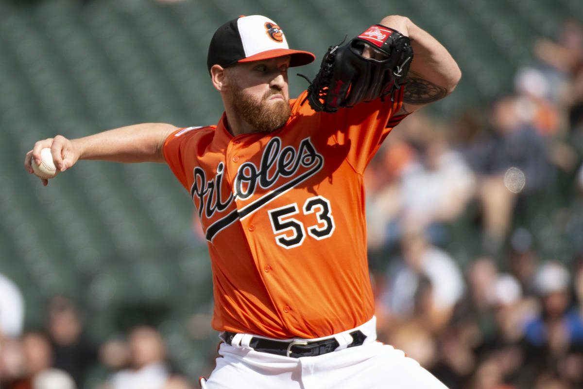 Baltimore Orioles starting pitcher Dan Straily (53) throws in the first inning of a baseball ga ...