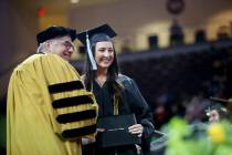 Elayna Harris receives her degree at the Nevada State College graduation ceremony at The Orlean ...