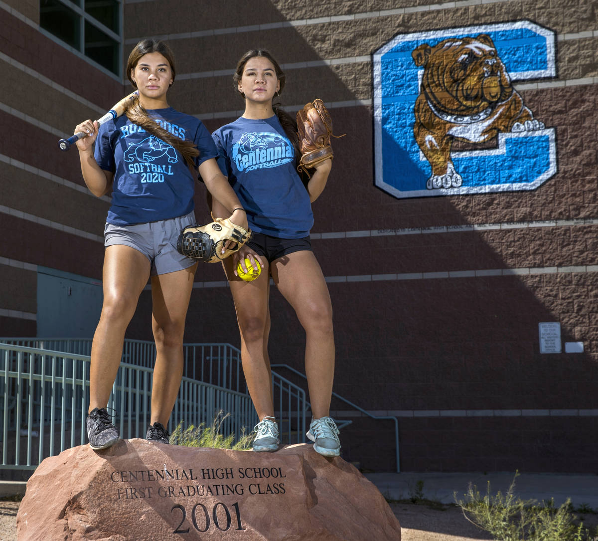 Samantha, left, and Natasha Lawrence as seniors from the Centennial High School softball team w ...