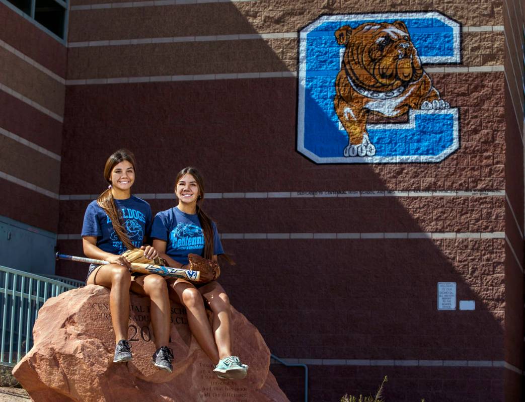 Samantha, left, and Natasha Lawrence as seniors from the Centennial High School softball team w ...