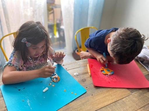 Residents of Inspirada Lily and Kaleo Mendoza enjoy creating their suncatchers. (Inspirada Comm ...