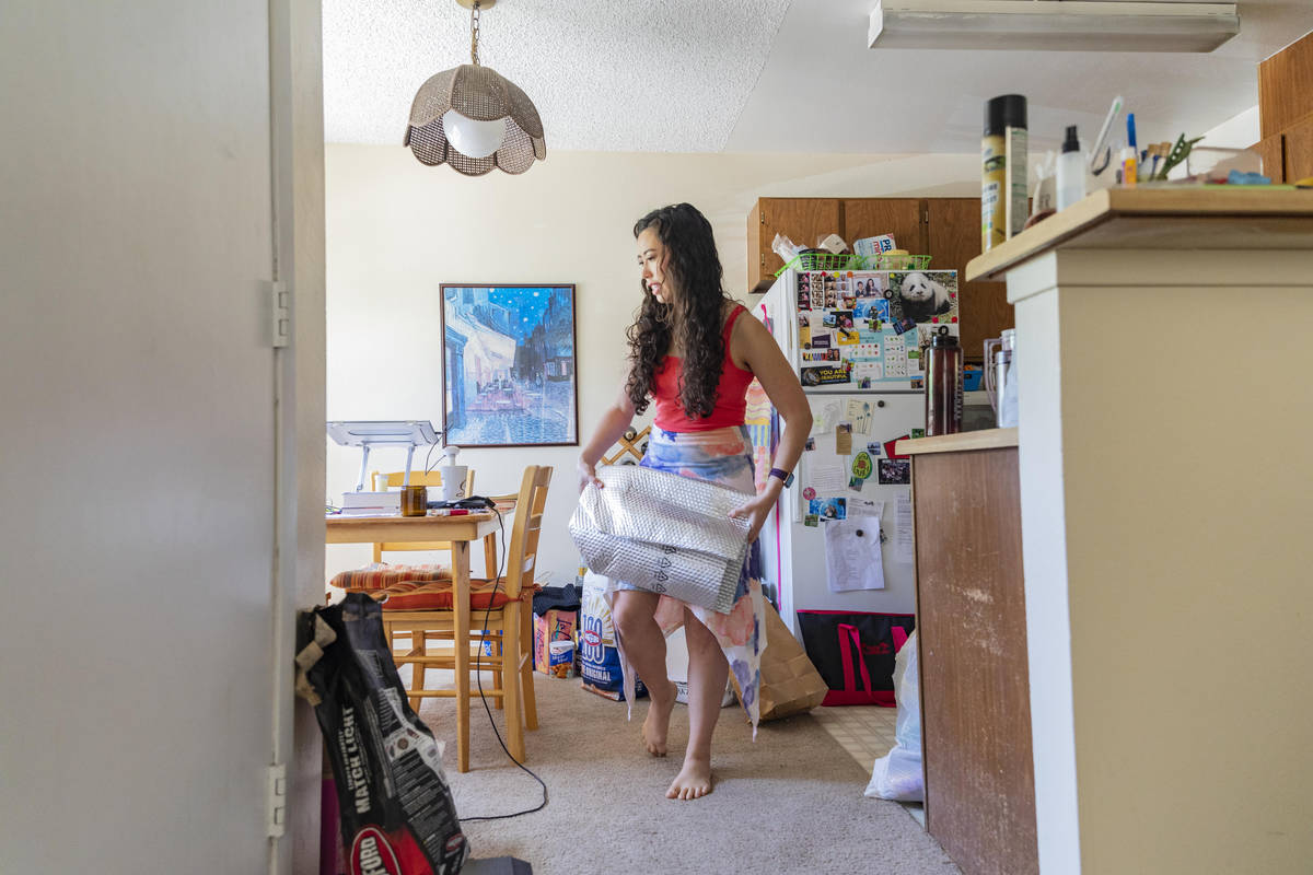 Sam O'Connell packs and cleans her apartment in Las Vegas on Tuesday, May 19, 2020. (Elizabeth ...