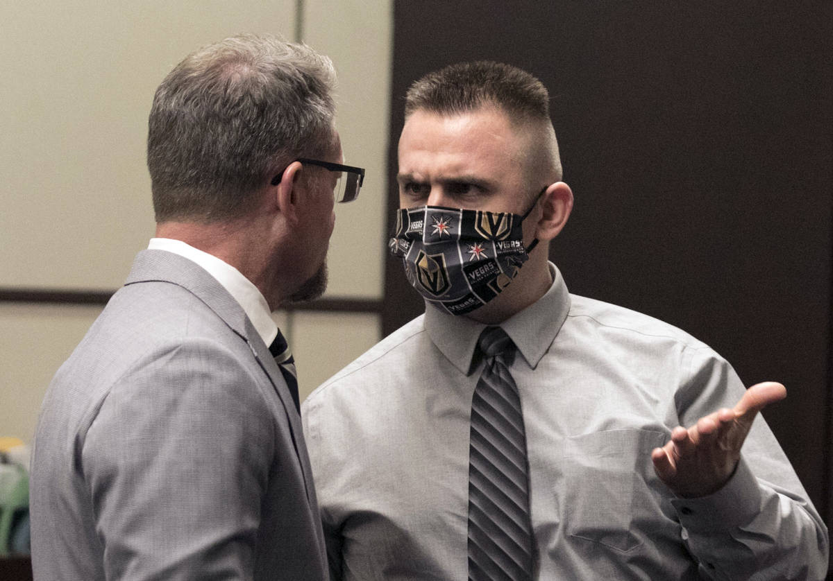 Joshua Nichols, right, accused of kidnapping, burglary and armed robbery, confers with his lawy ...