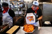 Vincent Rotolo, owner of Good Pie, gets ready to make a triple pepperoni Detroit style pizza in ...
