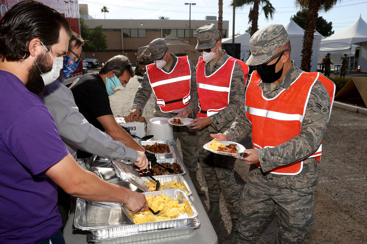 Nevada National Guard members who are helping with COVID-19 testing, including, from right, Air ...