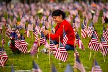 Vera Tourigny weeps while visiting her husband Raymond at the Southern Nevada Veterans Memorial ...