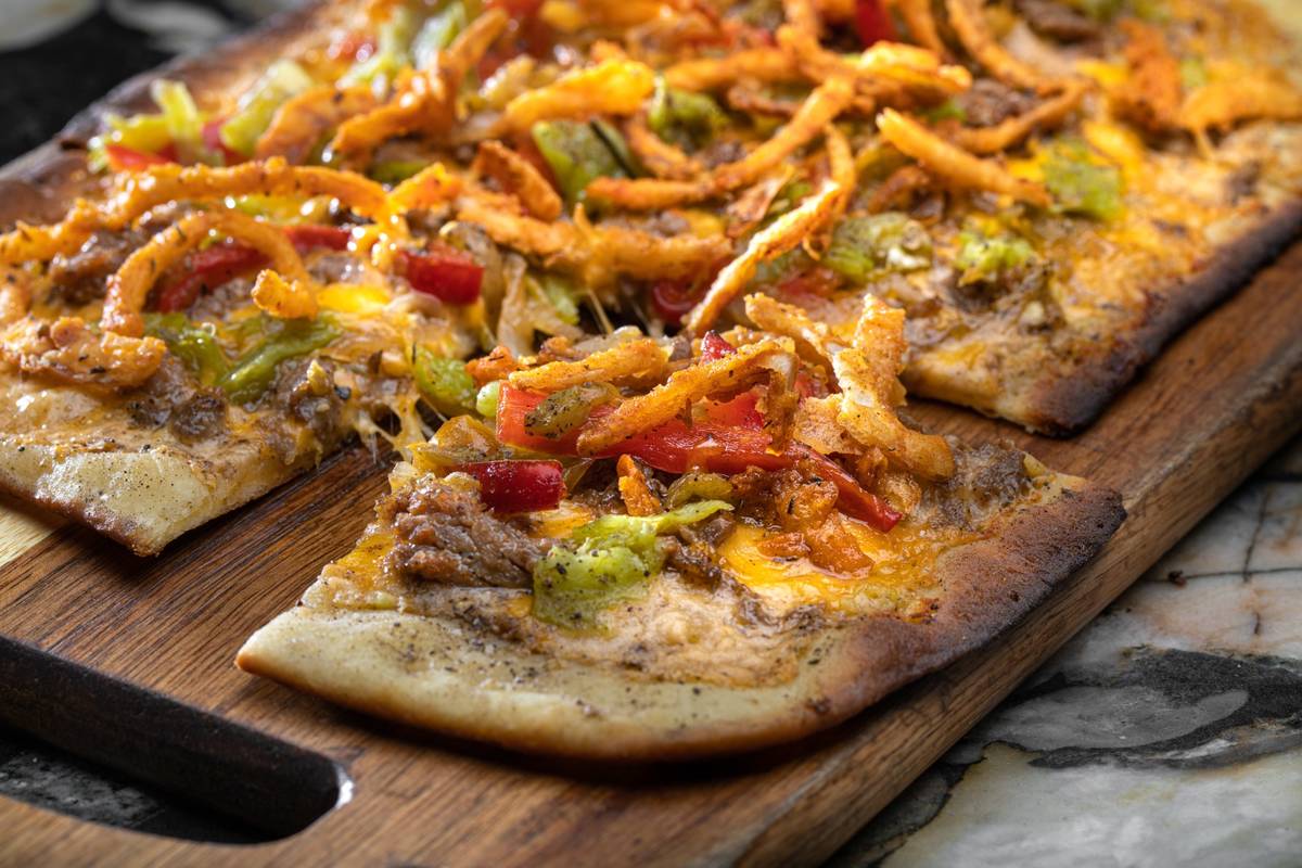 Hatch chile Philly flatbread at Carson Kitchen. The downtown eatery has reopened. (Chris Wessling)