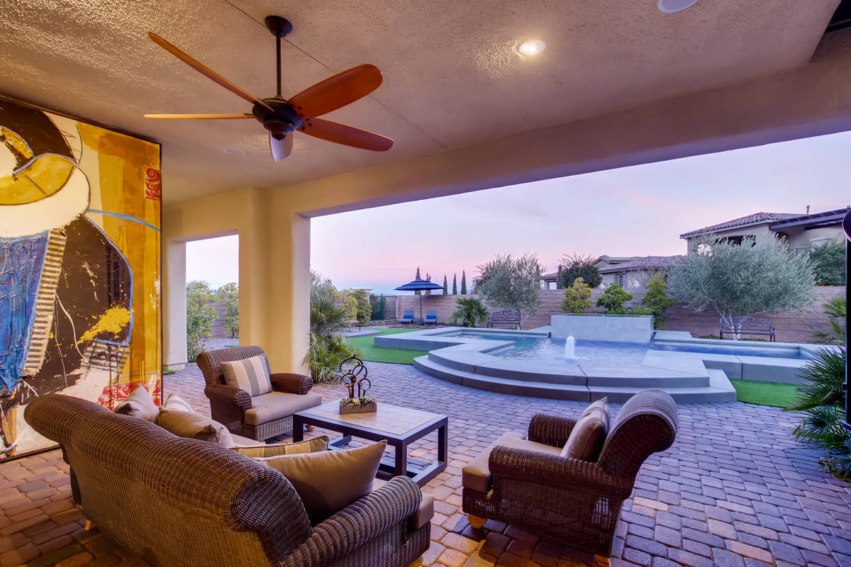 The patio leads to the pool. (Realty One Group)