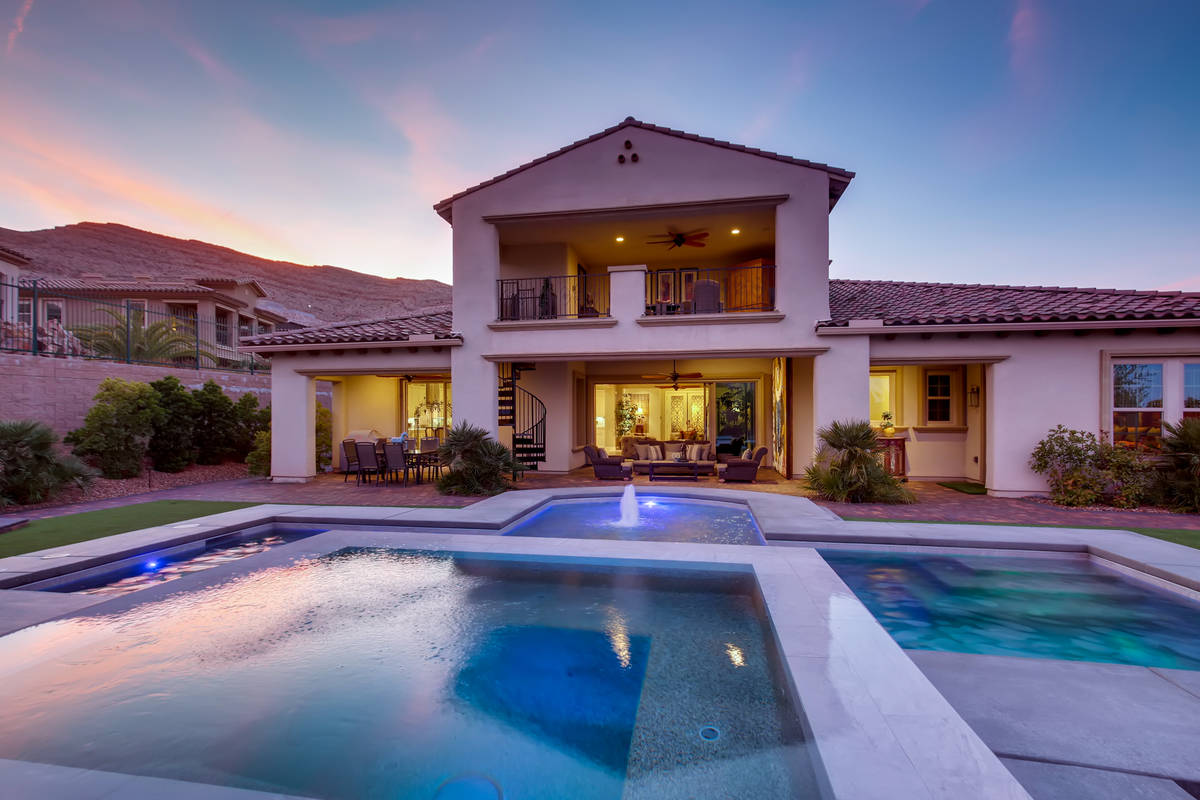 The two-story home has a pool. (Realty One Group)