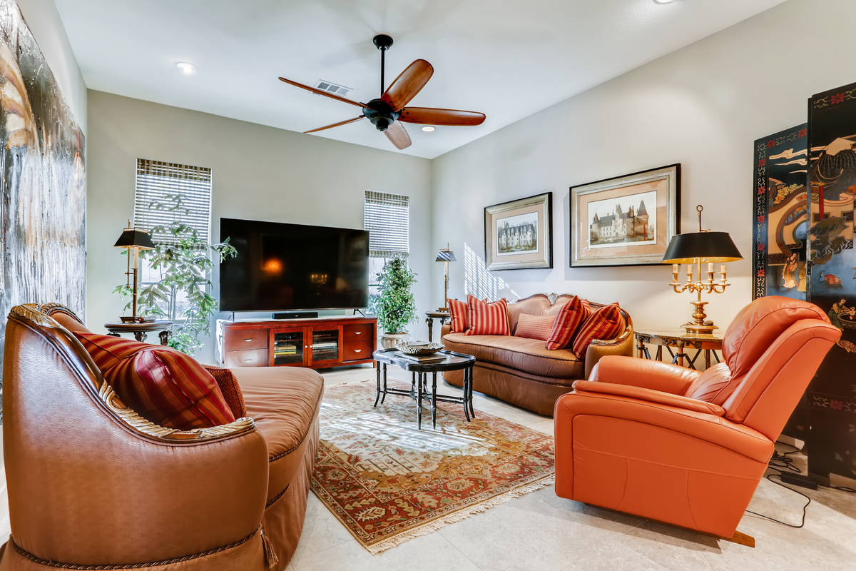 The Southern Highlands home features a family room that provides an intimate setting. (Realty O ...