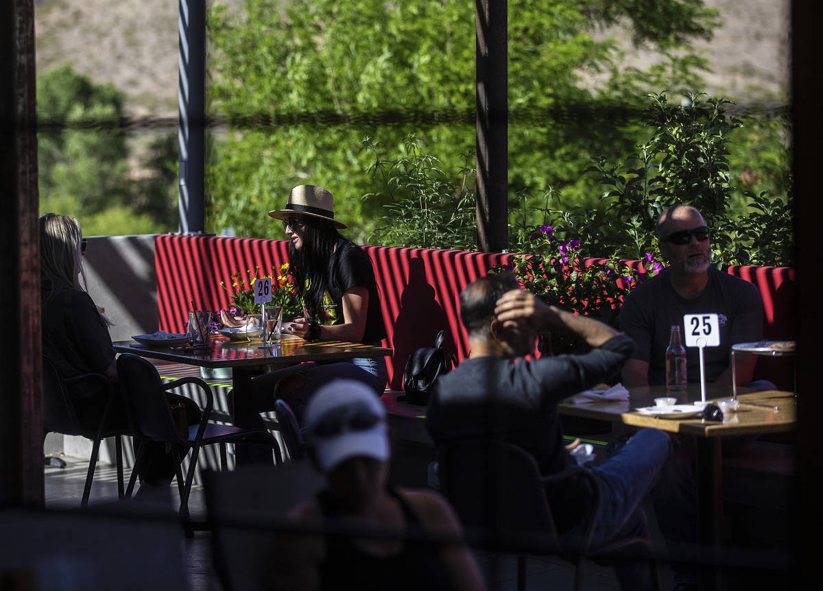 Diners enjoy lunch on the patio at Cottonwood Station in Blue Diamond on Wednesday, May 13, 202 ...