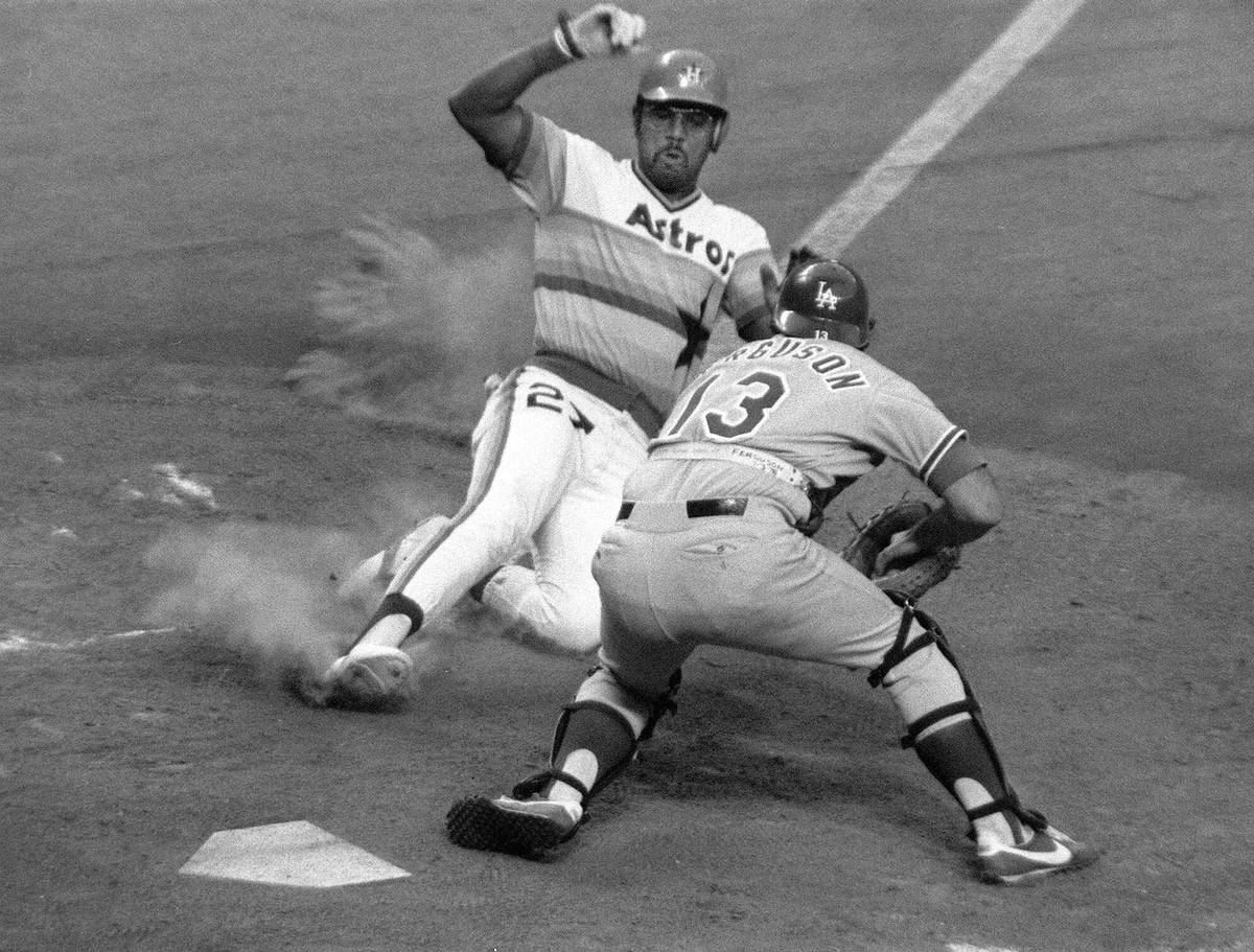 FILE - In this July 1978 file photo, Houston Astros first baseman Bob Watson (27) slides into h ...
