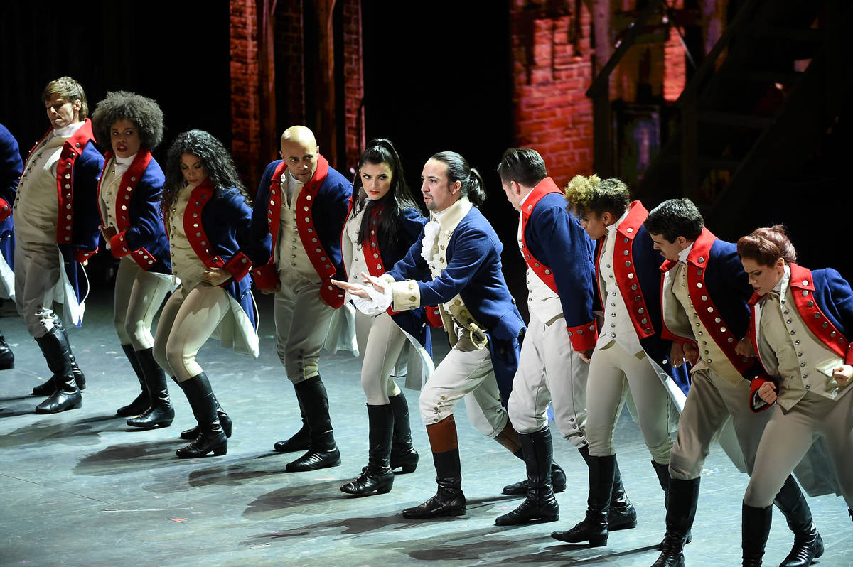 Actor Lin- Manuel Miranda, center, performs with the cast of "Hamilton" at the Tony A ...