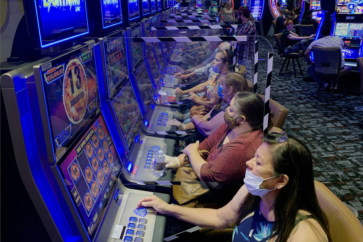 Plexiglass shields players as they gamble at Gila River Casino's Lone Butte  location on the pac … | Las Vegas Review-Journal