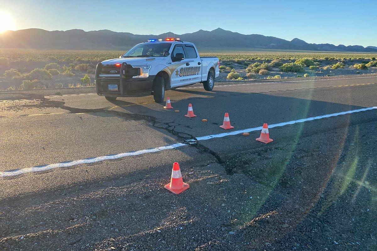 A Esmeralda County Sheriff's Office vehicle and cones block U.S. Highway 95 near Coaldale in we ...