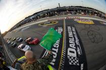 FILE - In this May 11, 2012, file photo, drivers take the green flag for the start of the NASCA ...
