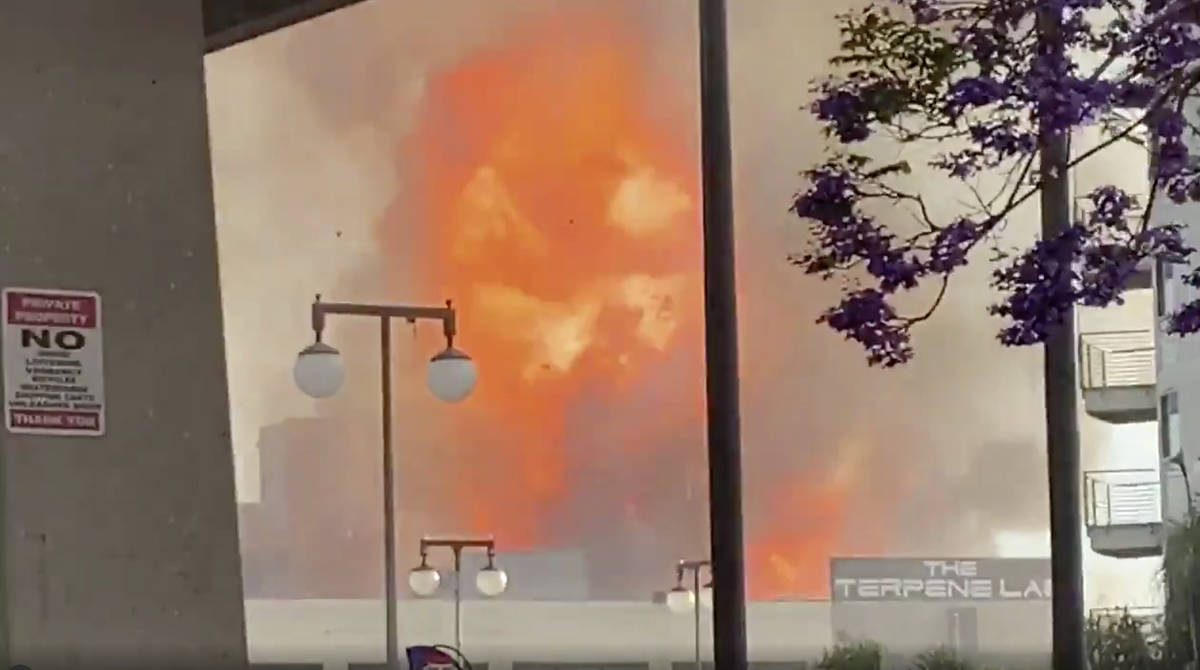 In this screen grab from video provided by Sean Miura, flames from an explosion are seen Saturd ...