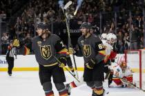 Vegas Golden Knights center William Karlsson (71) celebrates his score with right wing Alex Tuc ...