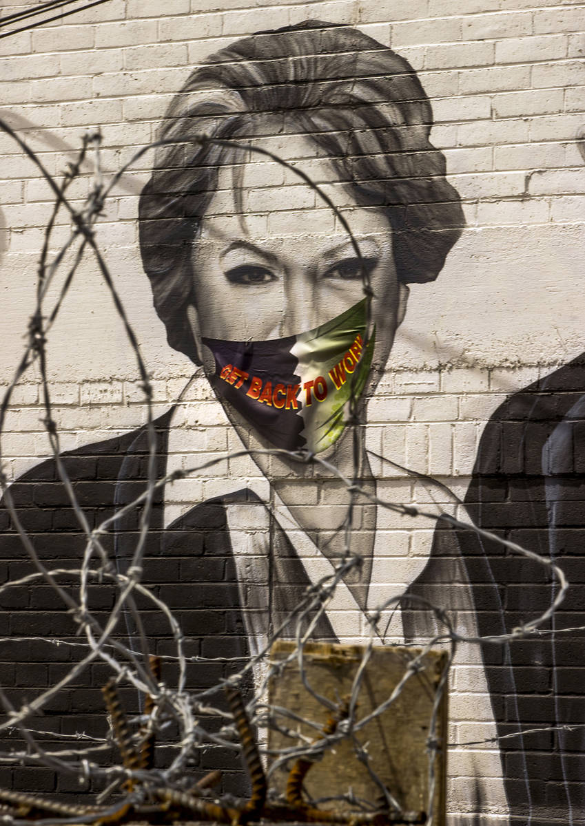 Mayor Carolyn Goodman is portrayed in a mural now wearing a face mask along a back wall of the ...